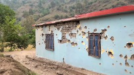 A property damaged after heavy firing and shelling by Pakistan military across the Line of Control, in Rajouri district on Wednesday