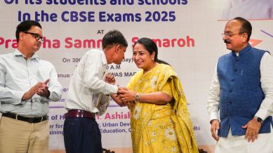 Delhi Chief Minister Rekha Gupta and state Minister Ashish Sood felicitate a CBSE student.