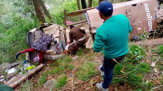 Rescue personnel at the site of the helicopter crash at Gangani in Uttarkashi district on Thursday