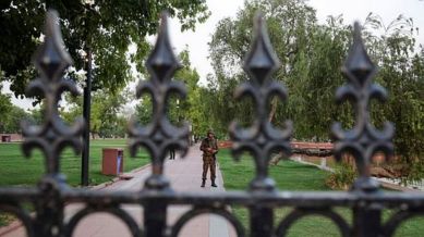bank A military personnel with Indian Army stand guard inside the garden near India Gate in New Delhi, India, May 8, 2025. REUTERS/Anushree Fadnavis