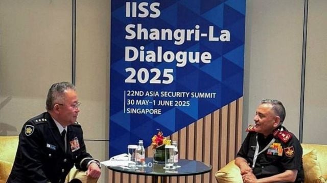 Sindoor Chief of Defence Staff General Anil Chauhan interacts with Japan Chief of Staff, Joint Staff, JSDF, General Yoshida Yoshihide during Shangri-La Dialogue 2025, on Friday