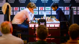 Magnus Carlsen takes on Gukesh in the first round of the Norway Chess tournament at Stavanger on Monday. (Norway Chess via Michal Walusza)