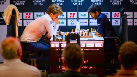 Magnus Carlsen takes on Gukesh in the first round of the Norway Chess tournament at Stavanger on Monday. (Norway Chess via Michal Walusza)