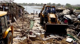 Ahmedabad demolition drive Day 2: Homes razed, bulldozers now turn to shops at Chandola lake