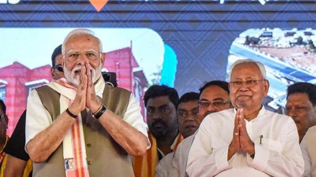 Prime Minister Narendra Modi and Bihar Chief Minister Nitish Kumar during a public meeting, in Rohtas district, Bihar,