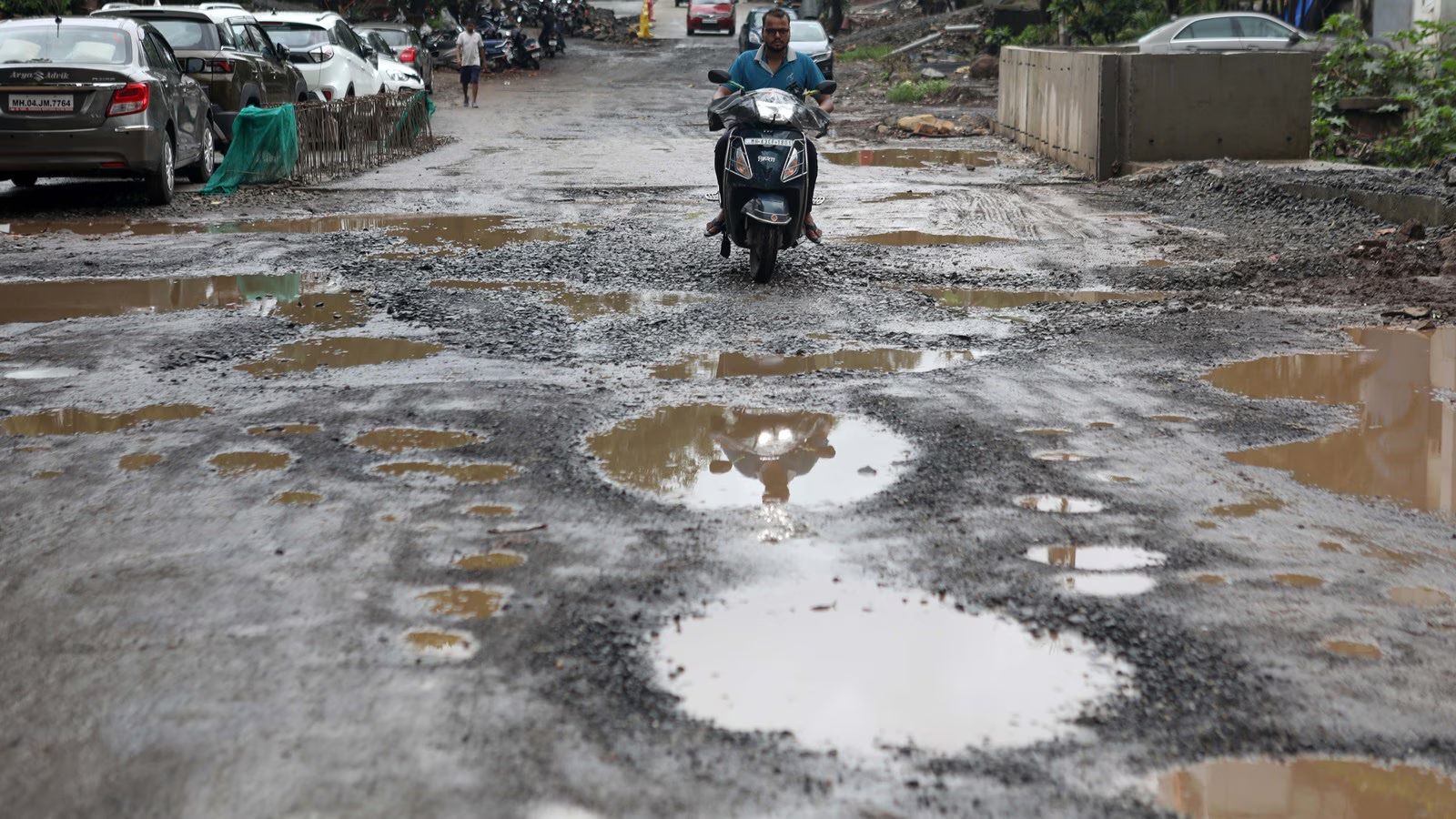 mumbai, utwt, mumbai potholes,