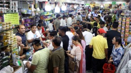 people rush to shops and stores to stockpile groceries and other daily stocks ..Scene at one of the store in Ludhiana on Wednesday .
