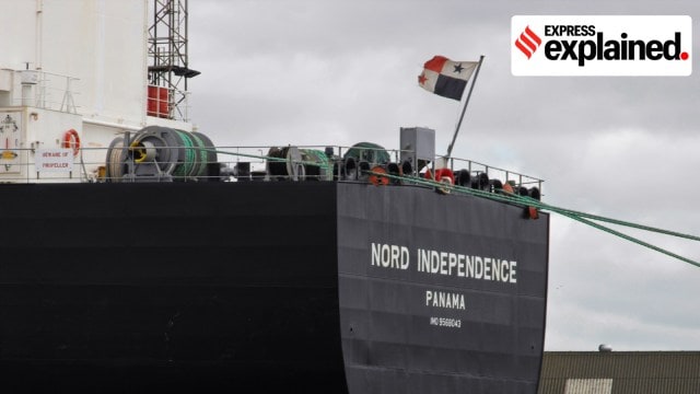 A ship with a Panama flag, which is a country flag that is often preferred by merchant ships.