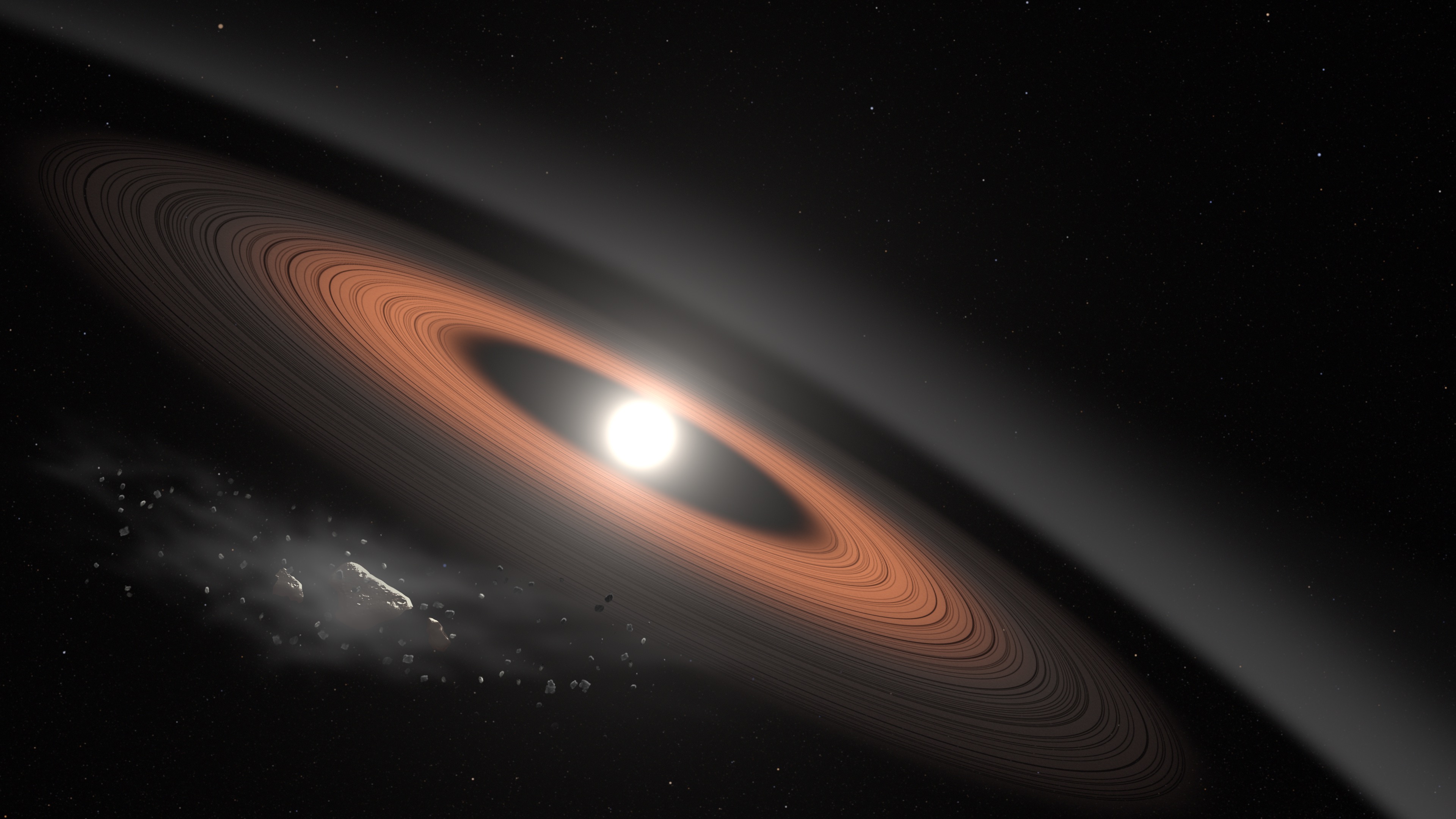 An asteroid breaks apart near white dwarf LSPM J0207+3331, surrounded by dusty debris rings. (Illustration: NASA’s Goddard Space Flight Center/Scott Wiessinger)