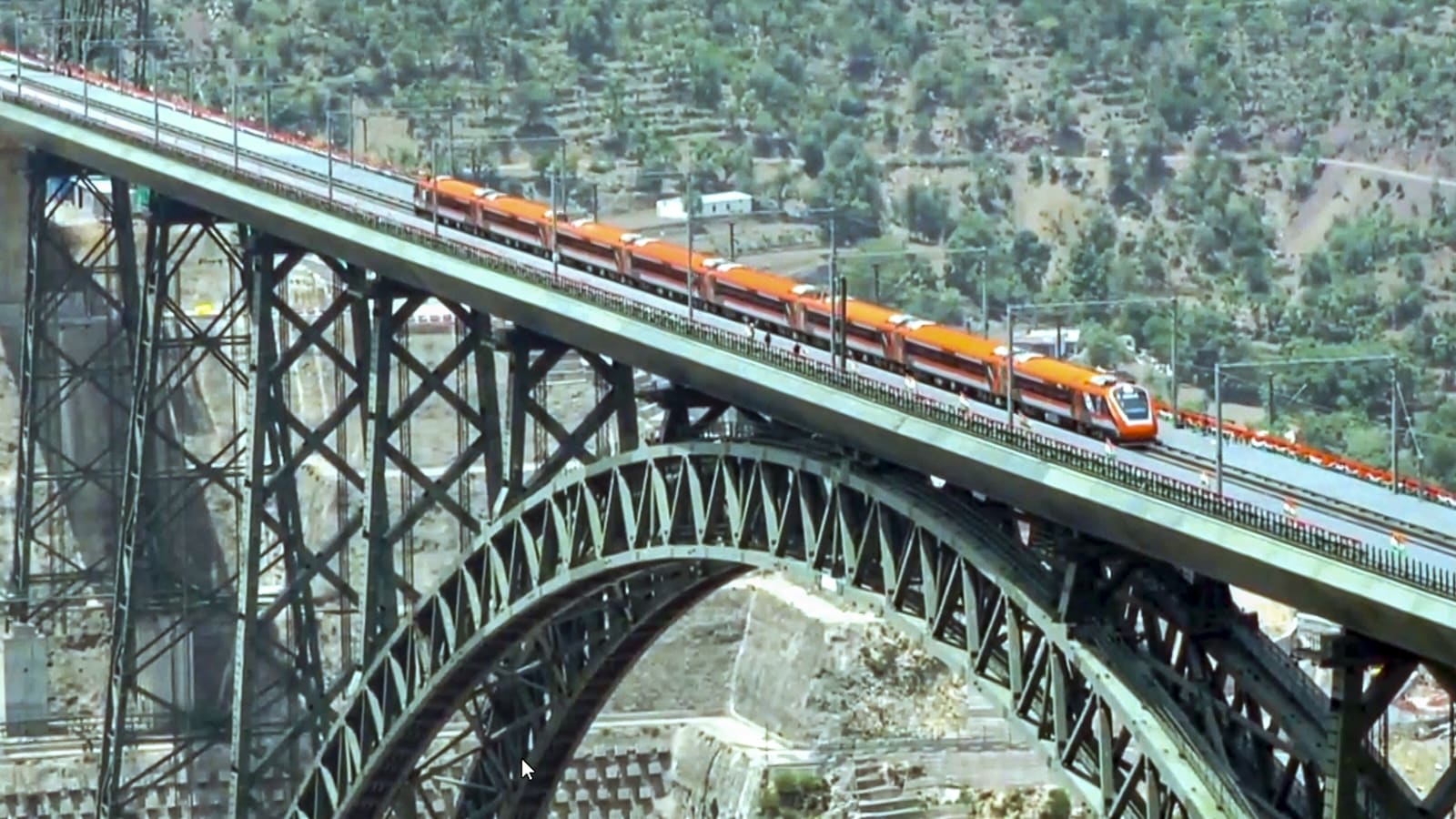 Chenab railway bridge, world's highest rail bridge, Jammu and Kashmir railway project, Vande Bharat Srinagar Katra, Chenab bridge inauguration, PM Modi Chenab bridge, Vande Bharat trains Kashmir, Chenab bridge construction, Chenab bridge challenges, Konkan Railway Chenab bridge, Chenab bridge design, High-speed rail bridge, USBRL project, Narendra Modi inauguration, Indian Railways infrastructure, Chenab River bridge height, railway connectivity Kashmir, tallest railway arch bridge, Express Explained
