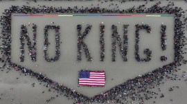 crowd protests no king