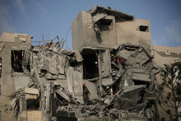 Israeli soldiers search for survivors amid the rubble of residential buildings destroyed by an Iranian missile strike that killed several people, in Beersheba, Israel (AP Photo/Leo Correa)