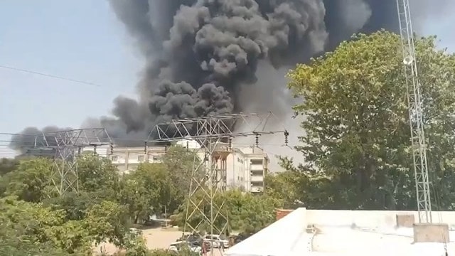 Smoke emanating from the area near the Ahmedabad airport where the Air India flight crashed