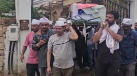 For crash survivor, a difficult journey: Carrying kin’s coffin