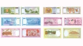 The caretaker government on Sunday unveiled notes for three out of the nine different denominations.