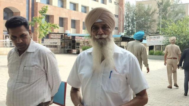 Cop Malkit Singh, one of the accused in the 1993 Fake Encounter Case, at court in Mohali on Saturday.
