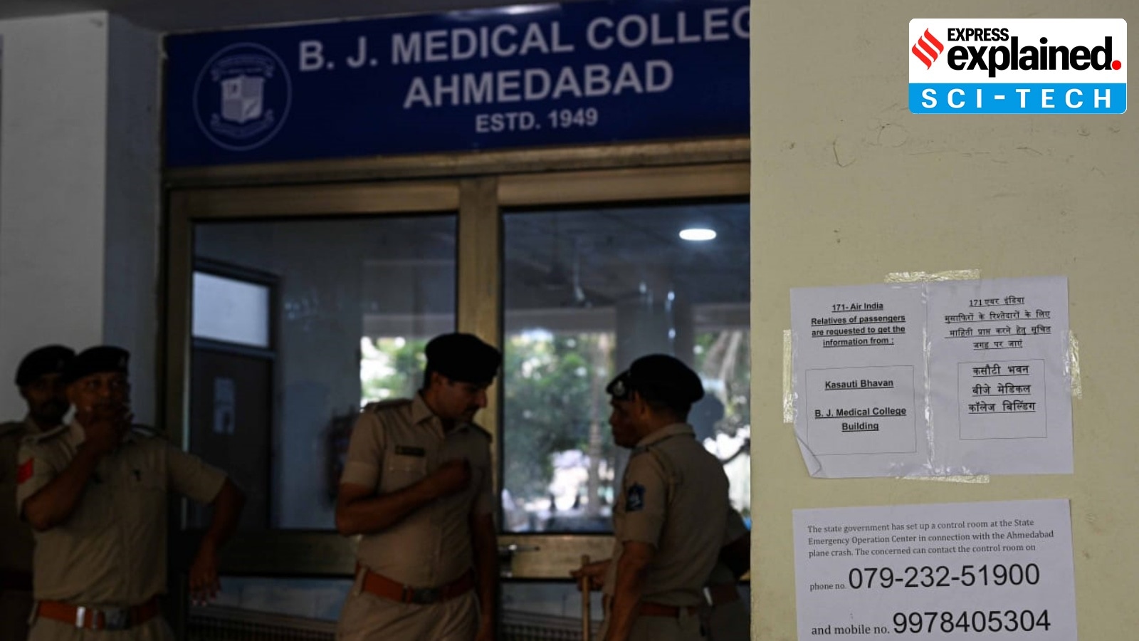 Police stand guard outside the postmortem room and the Kasauti Bhavan (where the DNA samples are being taken), at BJ medical college in Ahmedabad on Saturday.