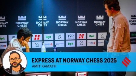 Magnus Carlsen checks out Gukesh's game against Wei Yi in round 9 of Norway Chess on Thursday in Stavanger. (PHOTO: Michal Walusza via Norway Chess)