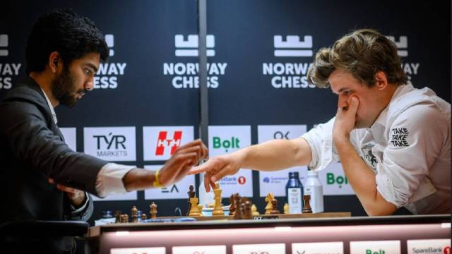 D Gukesh grandfather Magnus Carlsen