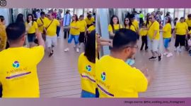 The tourists can be seen in yellow T-shirts, hinting at a travel organisation handling their itinerary (Image source: @the_walking_lens_/Instagram)