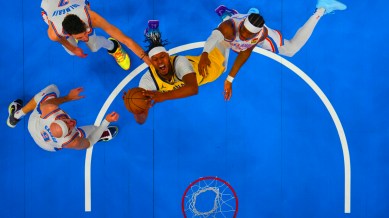 Indiana Pacers' Myles Turner (33) is guarded by Oklahoma City Thunder's Chet Holmgren (7) and Alex Caruso (9) during Game 5 of the NBA Finals basketball series in Oklahoma City. (AP Photo)