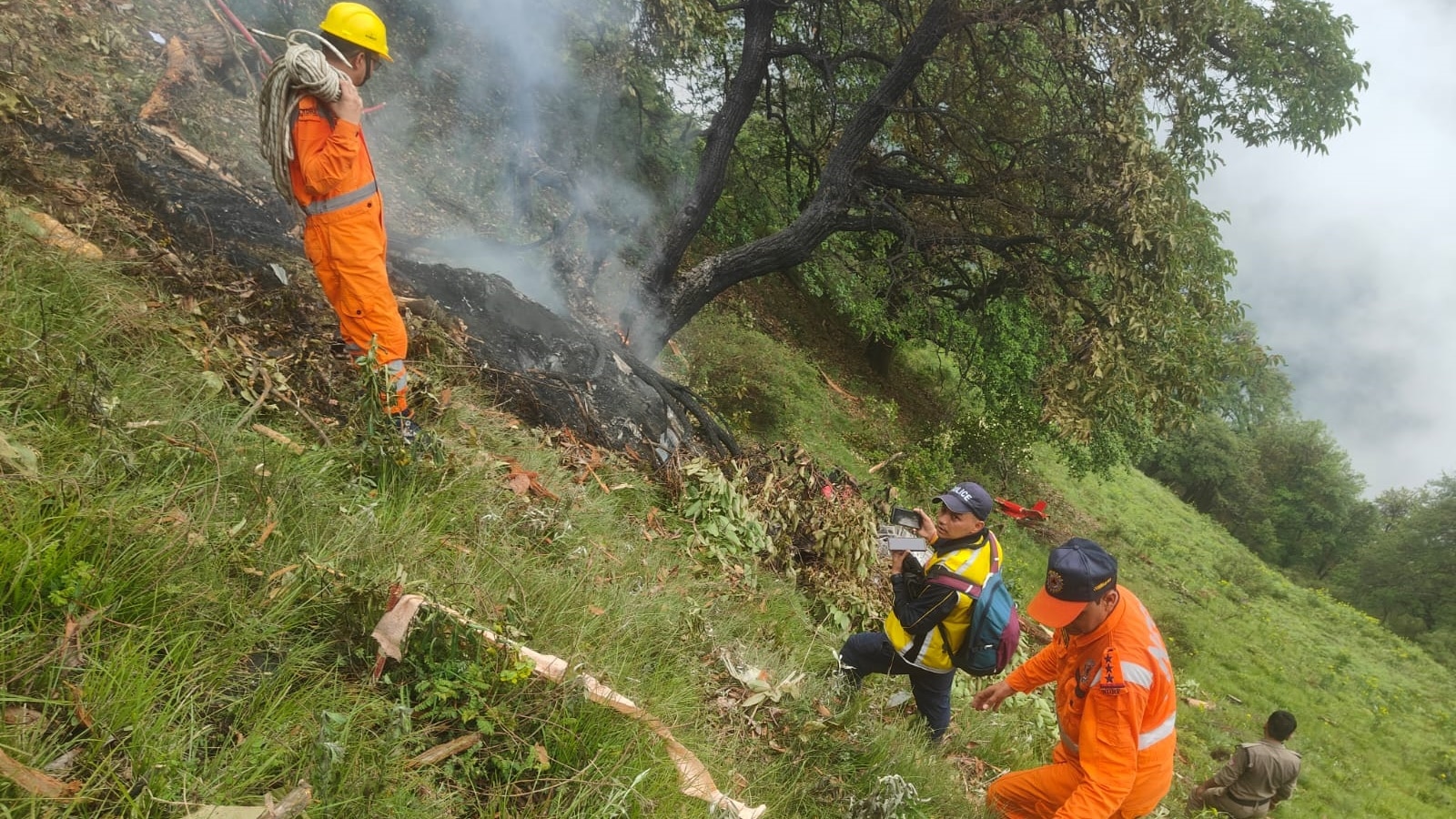 Kedarnath Helicopter Crash: Rescue and relief personnel at the site of the helicopter crash near Gaurikund