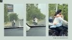 A passenger in a car filmed the risky stunt and later shared it online
