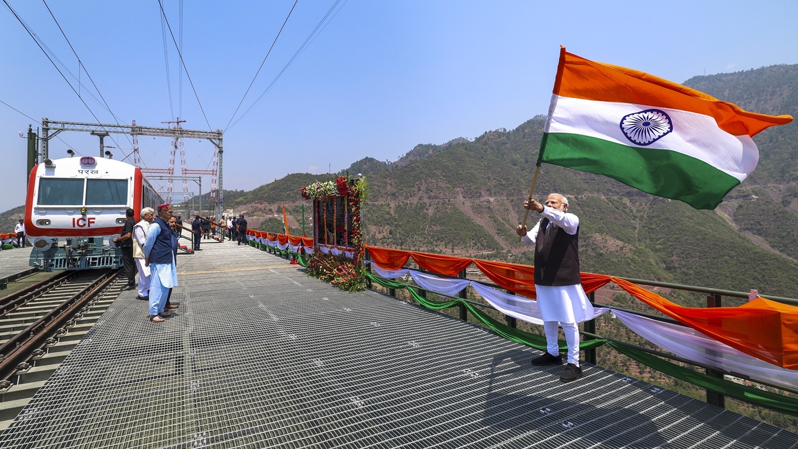 Chenab railway bridge, world's highest rail bridge, Jammu and Kashmir railway project, Vande Bharat Srinagar Katra, Chenab bridge inauguration, PM Modi Chenab bridge, Vande Bharat trains Kashmir, Chenab bridge construction, Chenab bridge challenges, Konkan Railway Chenab bridge, Chenab bridge design, High-speed rail bridge, USBRL project, Narendra Modi inauguration, Indian Railways infrastructure, Chenab River bridge height, railway connectivity Kashmir, tallest railway arch bridge, Express Explained