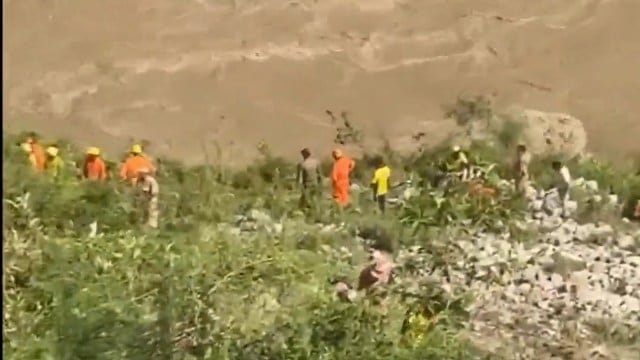 Rescue personnel at the site of the accident in Rudraprayag