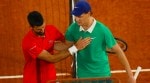 Jannik Sinner, right, and Novak Djokovic greet each other after their semifinal match of the French Tennis Open at the Roland-Garros stadium in Paris on June 6, 2025. (AP Photo)