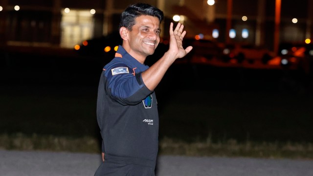 SpaceX Falcon 9 crew member Shubhanshu Shukla waves before departing to pad 39A for a launch to the International Space Station at the Kennedy Space Center in Florida