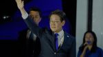 South Korea's Democratic Party's presidential candidate Lee Jae-myung greets supporters outside of the National Assembly in Seoul, South Korea, Wednesday, June 4, 2025. (AP Photo/Ahn Young-joon)