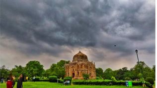 Visitors at the Lodhi Garden on a cloudy afternoon, in New Delhi, Saturday, June 28, 2025. (PTI Photo)