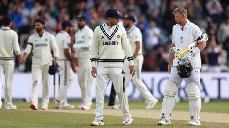 Joe Root interacts with Shubman Gill after England won the first cricket test match against India at Headingley in Leeds (AP Photo)