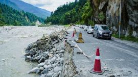 himachal A view of a damaged portion of a road following flash flood triggered by a cloudburst in Sainj Valley, in Kullu on Thursday. (ANI Photo)
