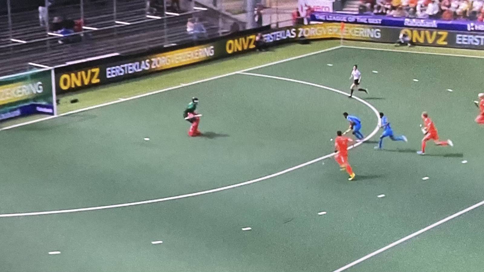 Lalit Upadhyay was one-on-one with Dutch goalkeeper Maurits Visser. He tried to lob the six-foot-plus goalie, who easily saved it.