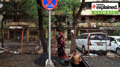 Following heavy rainfall last week, labourers worked to clear the stormwater drains along the Eastern Express Highway in mumbai.