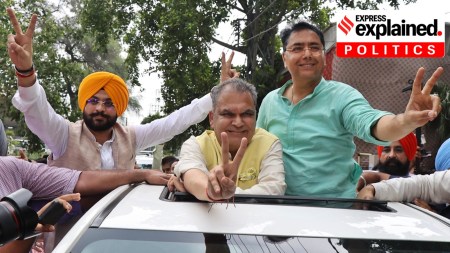 AAP candidate Sanjeev Arora (centre) with Punjab Cabinet minister Aman Arora and Tarunpreet Singh Saundh, after winning the Ludhiana West byelection on Monday (June 23).