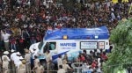An ambulance arrives at the M. Chinnaswamy Stadium as fans gather to celebrate Royal Challengers Bengaluru's IPL title win (AP Photo)