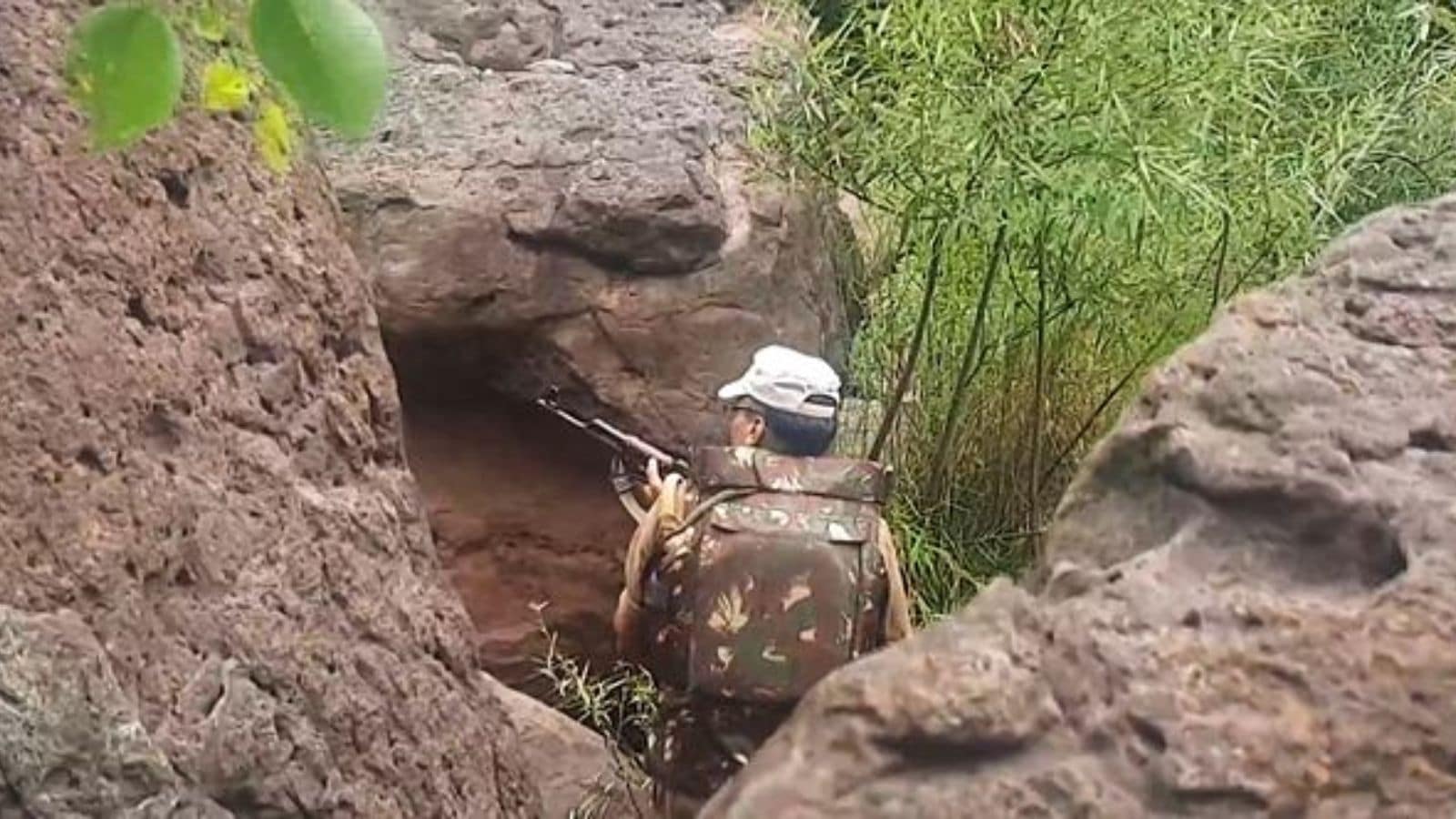 A security personnel during a search operation after an encounter broke out between security forces and terrorists in a remote forested area, in Jammu and Kashmir's Udhampur district, Thursday, June 26, 2025. (PTI Photo)