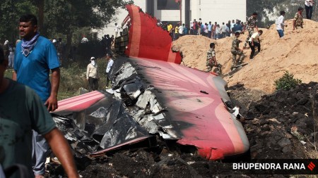 The wreckage of the Air India aircraft that had crashed in Ahmedabad being removed