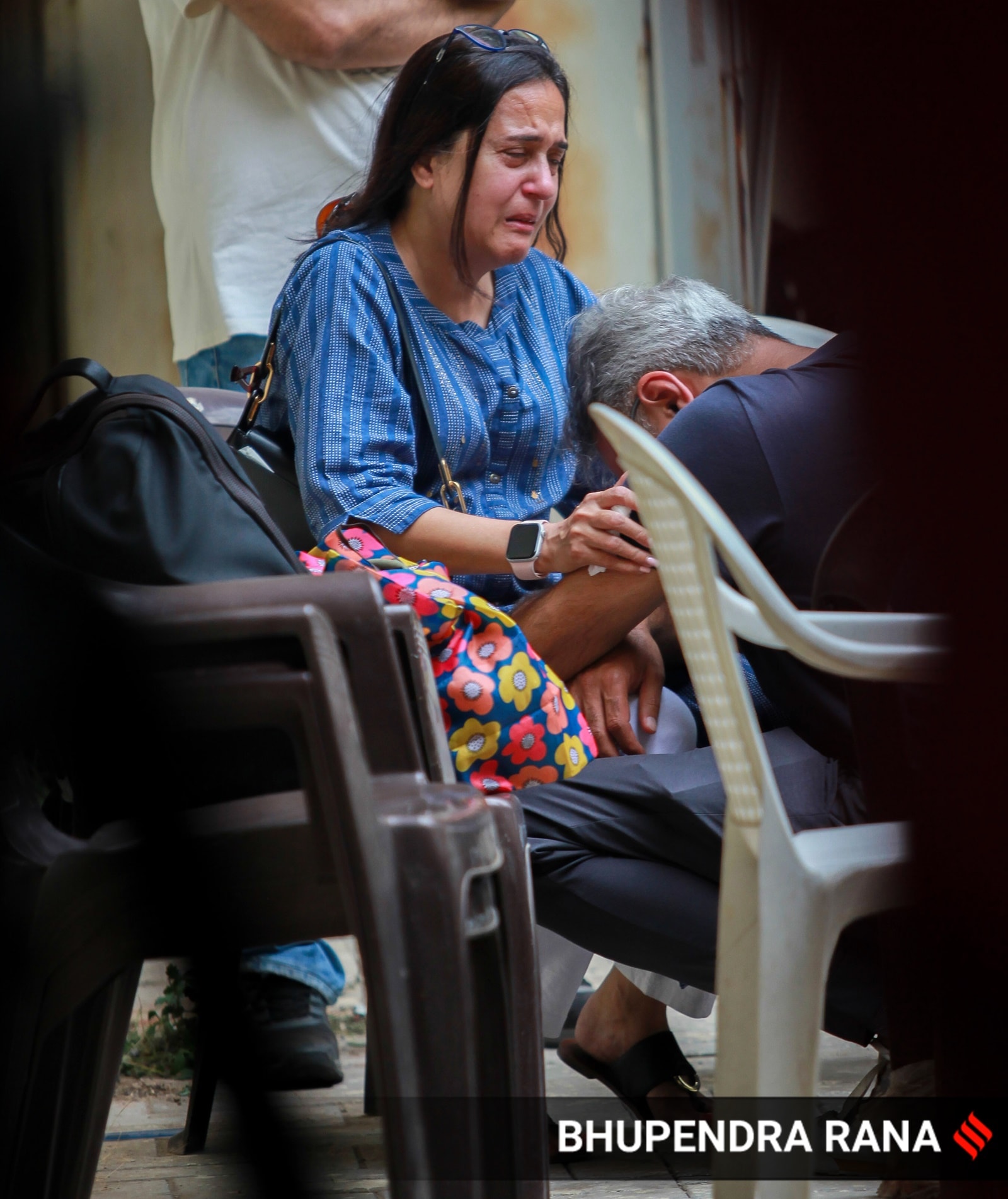 Families of victims of the Air India plane crash at the DNA testing centre in Ahmedabad