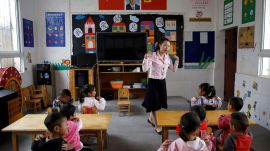 China kindergarten lead poisoning, Gansu food safety scandal, Peixin kindergarten poisoning, lead-laced food China, Chinese children lead poisoning, school food contamination China, China kindergarten scandal 2025, toxic food scandal China, Tianshui lead poisoning case, Chinese food safety violations, lead poisoning cover-up, China child health crisis, industrial pigment in food, forged test results China, China preschool poisoning news