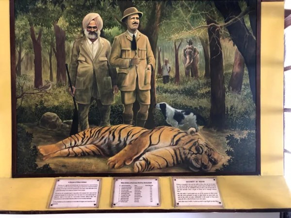 Corbett insisted that man-eating was abnormal behavior,  the result of injury, age, or human interference, in the photo he stands over a tiger killed by him 