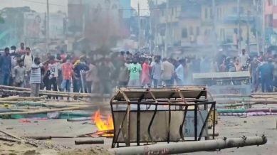 In this image made from a video, supporters of the ousted Prime Minister Sheikh Hasina clash with the police in Gopalganj, Bangladesh, Wednesday, July 16, 2025. (AP Photo)