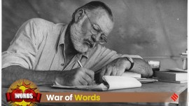 A photograph of Nobel Laureate Ernest Hemingway writing