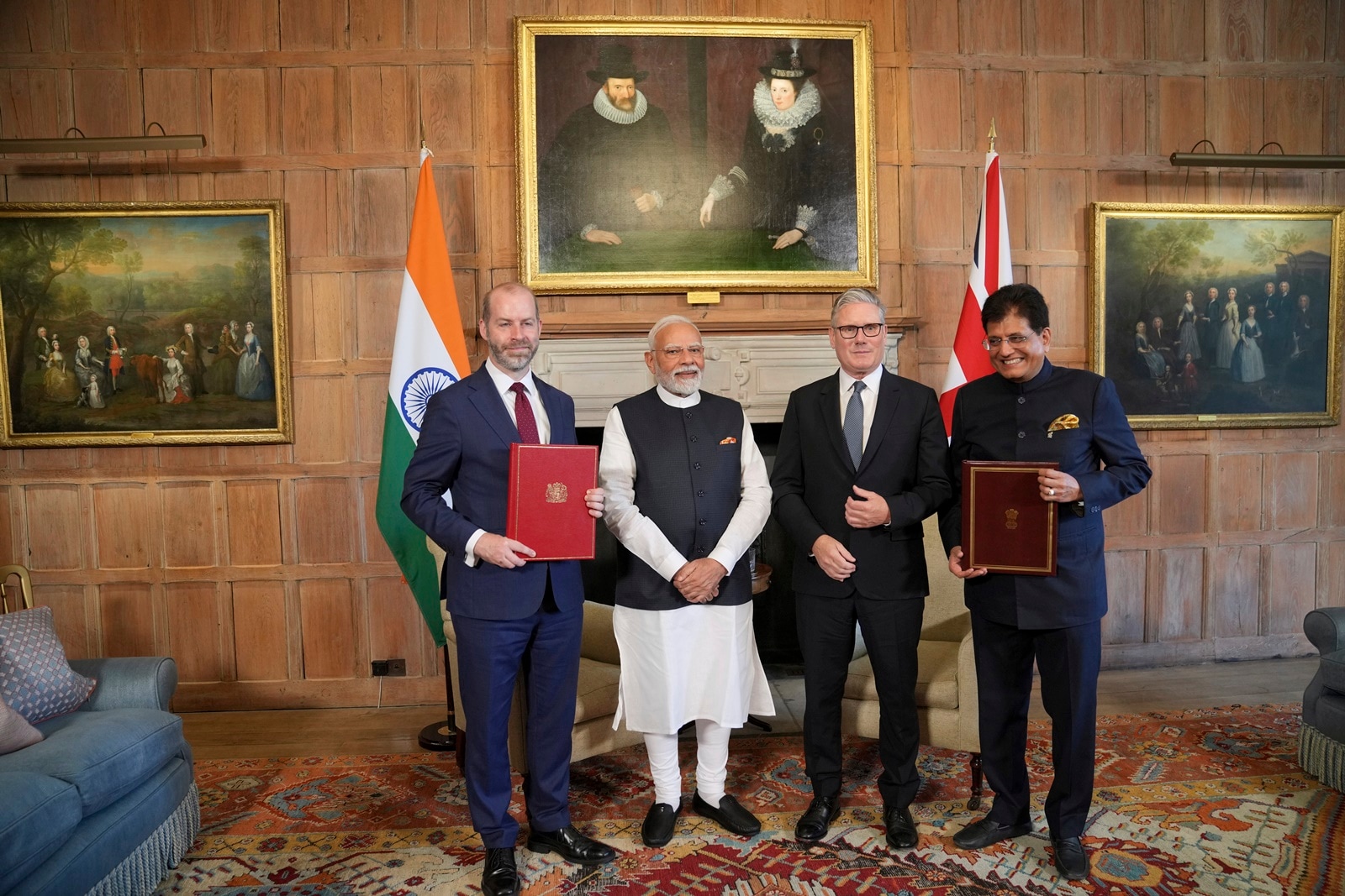UK Prime Minister Keir Starmer and Prime Minister Narendra Modi pose for a photo after the free trade agreement was signed on Thursday