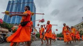 'Kanwariyas' carry holy water to Shiv Vishnu Temple during the holy month of 'Shravan',