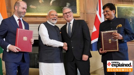 Prime Minister Narendra Modi and UK PM Keir Starmer pose for a photograph after signing the free trade agreement on Thursday