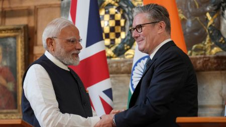 Britain's Prime Minister Keir Starmer and Prime Minister Narendra Modi of India shake hands after signing a free trade agreement at Chequers near Aylesbury, England, Thursday, July 24, 2025.(AP Photo/Kin Cheung, Pool)